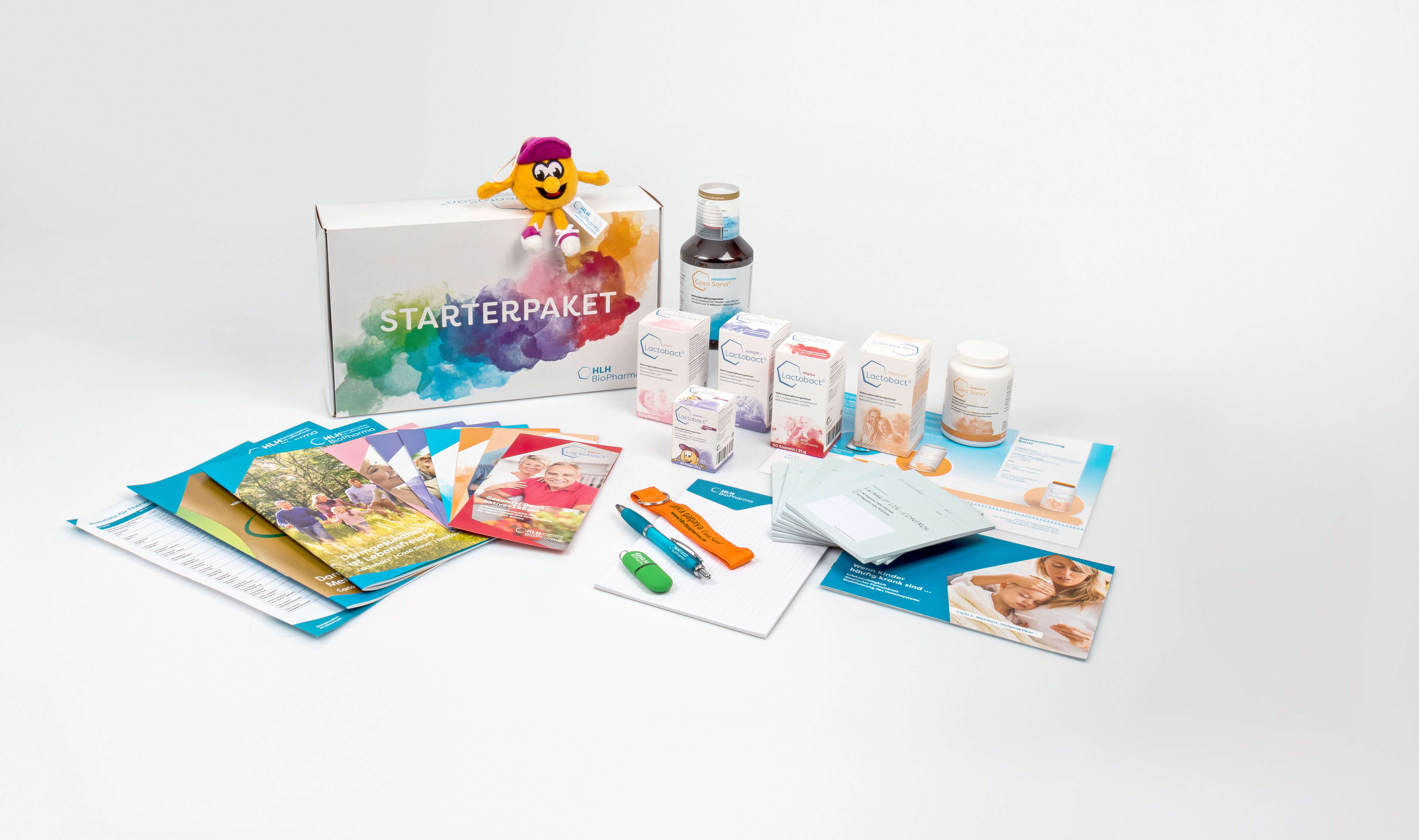 Foto verschiedener HLH Produkte und Werbematerialien